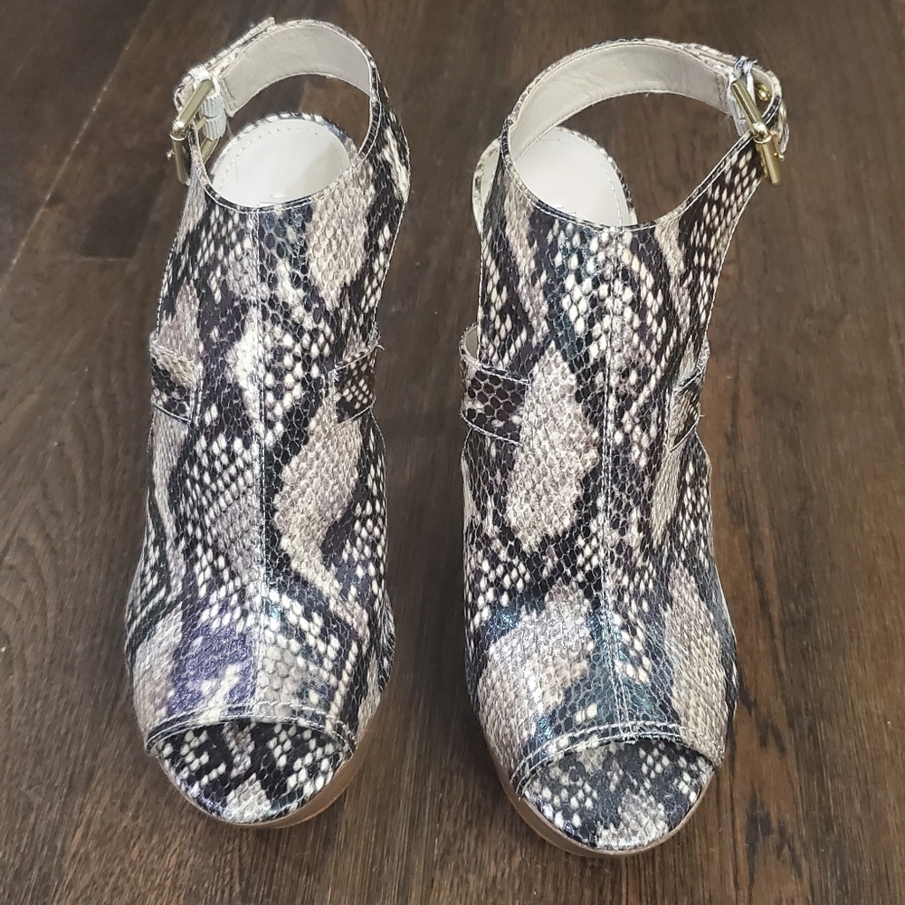 **Never Worn** Animal print peep toe heels